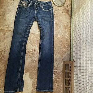 Gold and silver studded jeans